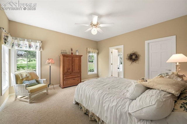 3479 Hill Cir, Colorado Springs, CO 80904 - bedroom featuring multiple windows, light colored carpet, and ceiling fan