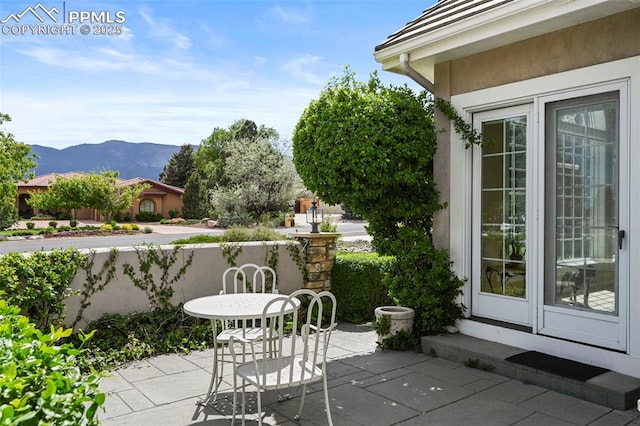 3479 Hill Cir, Colorado Springs, CO 80904 - view of patio featuring a mountain view and entry steps