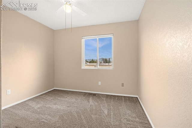 1810 Lanka Ln, Colorado Springs, CO 80915 - empty room featuring carpet, baseboards, and a ceiling fan