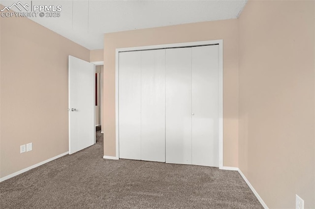 1810 Lanka Ln, Colorado Springs, CO 80915 - unfurnished bedroom featuring carpet flooring, baseboards, and a closet