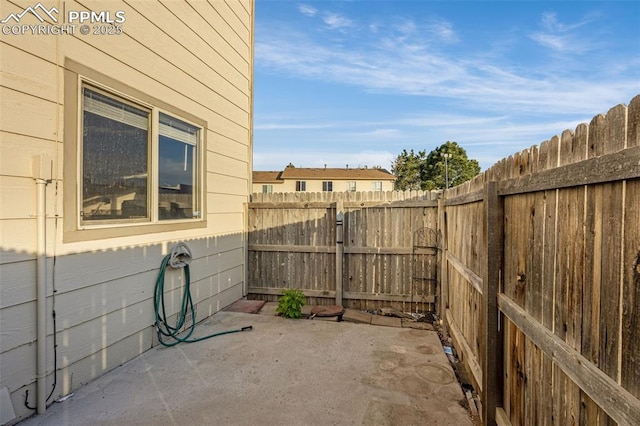 1810 Lanka Ln, Colorado Springs, CO 80915 - fenced backyard featuring a patio