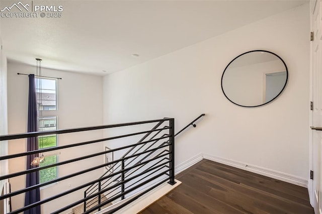 1747 Satin Spar Pt, Colorado Springs, CO 80908 - staircase with wood finished floors and baseboards