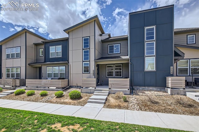 1747 Satin Spar Pt, Colorado Springs, CO 80908 - modern home with board and batten siding