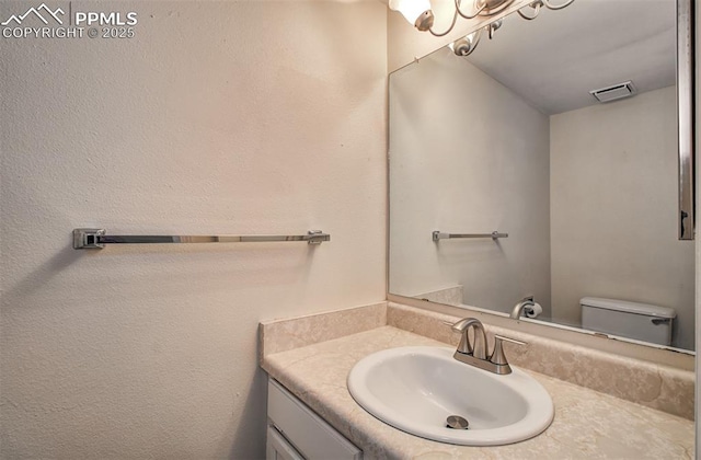 5573 Tamworth Dr, Colorado Springs, CO 80919 - bathroom with vanity and toilet