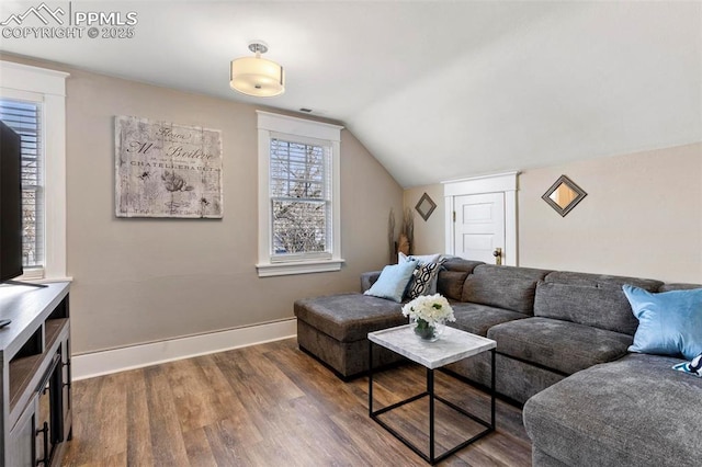 1807 W Colorado Ave, Colorado Springs, CO 80904 - living room with dark wood-type flooring, lofted ceiling, and baseboards