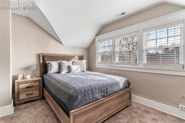 1807 W Colorado Ave, Colorado Springs, CO 80904 - carpeted bedroom with lofted ceiling and baseboards