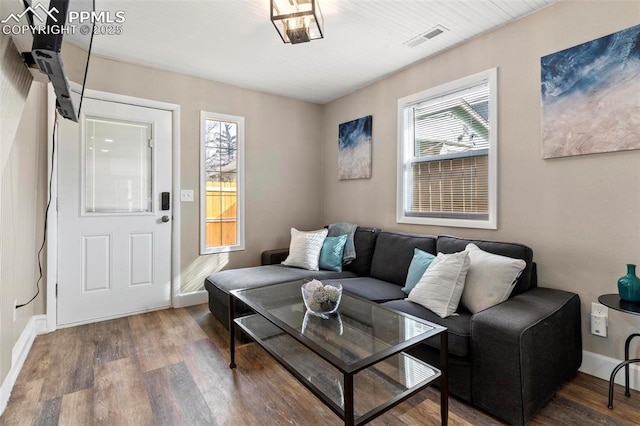1807 W Colorado Ave, Colorado Springs, CO 80904 - living area featuring wood finished floors and baseboards