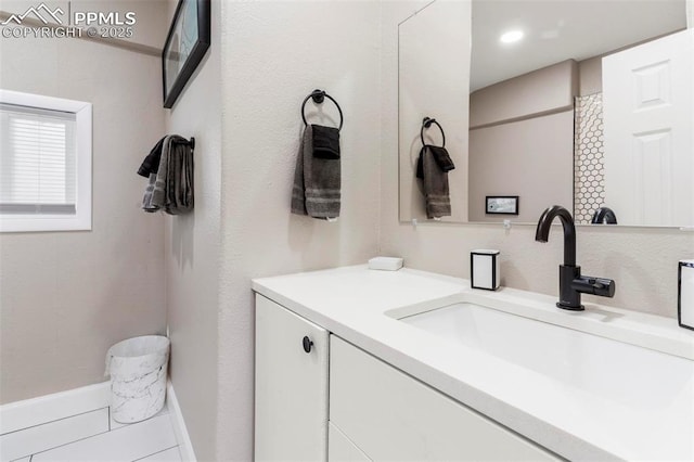 1807 W Colorado Ave, Colorado Springs, CO 80904 - bathroom with vanity and baseboards