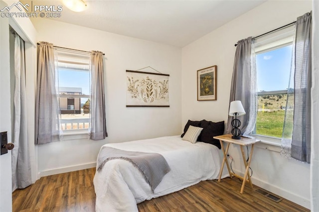 133 W Golden Ave, Cripple Creek, CO 80813 - bedroom featuring baseboards and wood finished floors