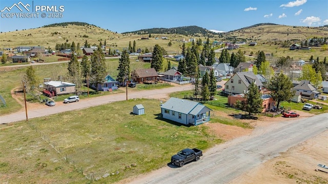 133 W Golden Ave, Cripple Creek, CO 80813 - aerial view of residential area with a mountain backdrop