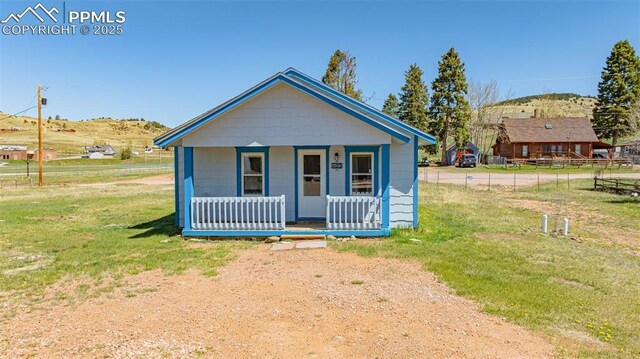 133 W Golden Ave, Cripple Creek, CO 80813 - bungalow-style house featuring a porch