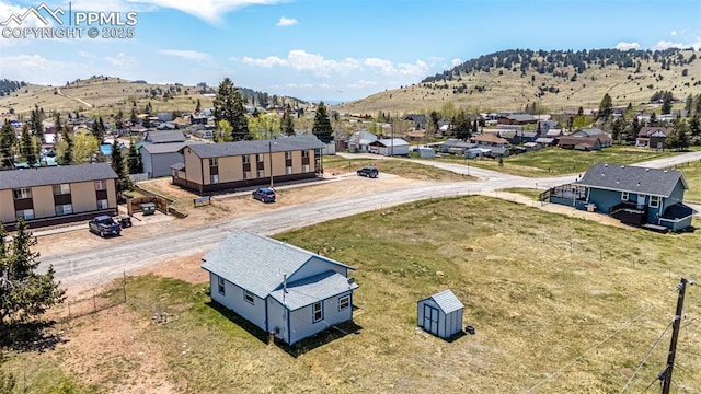 133 W Golden Ave, Cripple Creek, CO 80813 - aerial perspective of suburban area with a mountainous background