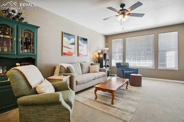 4219 Mesa Point, Colorado Springs, CO 80923 - carpeted living area with ceiling fan and baseboards