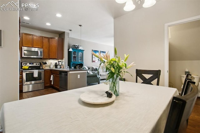 4219 Mesa Point, Colorado Springs, CO 80923 - dining room with dark wood-type flooring, a chandelier, and recessed lighting