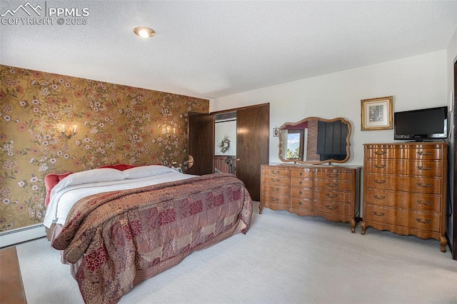2518 Avondale Dr, Colorado Springs, CO 80917 - carpeted bedroom featuring wallpapered walls and a closet