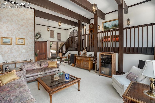 2518 Avondale Dr, Colorado Springs, CO 80917 - living room featuring carpet, beamed ceiling, stairway, wallpapered walls, and beverage cooler