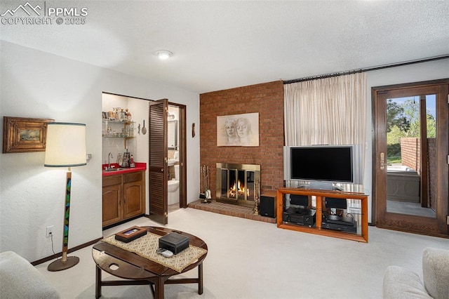 2518 Avondale Dr, Colorado Springs, CO 80917 - carpeted living area featuring a sink, a fireplace, and baseboards