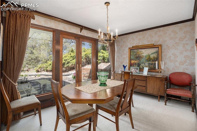 2518 Avondale Dr, Colorado Springs, CO 80917 - dining room with wallpapered walls, french doors, ornamental molding, a chandelier, and healthy amount of natural light