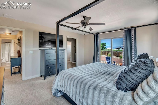 6728 Gelbvieh Rd, Peyton, CO 80831 - carpeted bedroom with access to outside and a ceiling fan