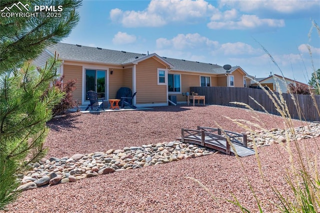 6728 Gelbvieh Rd, Peyton, CO 80831 - back of house with a patio and roof with shingles
