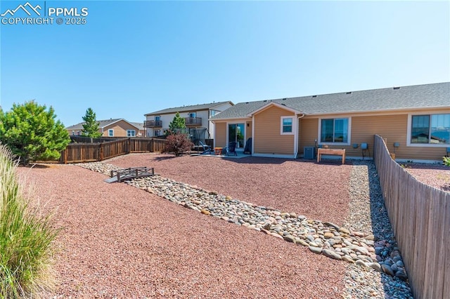 6728 Gelbvieh Rd, Peyton, CO 80831 - rear view of house with a patio and a fenced backyard