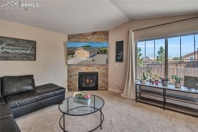 6728 Gelbvieh Rd, Peyton, CO 80831 - carpeted living area with lofted ceiling and a stone fireplace