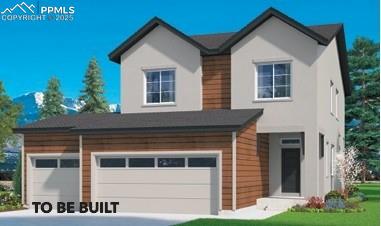 7932 Wilton Dr, Colorado Springs, CO 80908 - view of front facade with an attached garage, concrete driveway, and a front yard