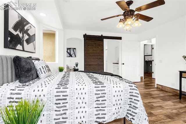321 Graceland Grv, Colorado Springs, CO 80904 - bedroom with a barn door, wood finished floors, baseboards, and a ceiling fan