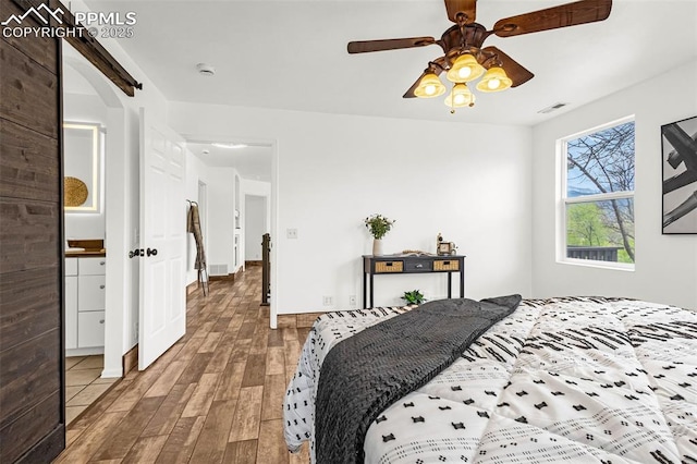 321 Graceland Grv, Colorado Springs, CO 80904 - bedroom featuring wood finished floors and a ceiling fan