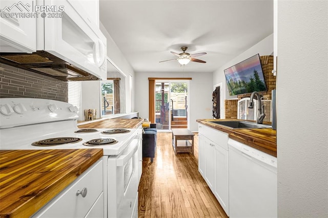 321 Graceland Grv, Colorado Springs, CO 80904 - kitchen with white appliances, wooden counters, a sink, ceiling fan, and decorative backsplash