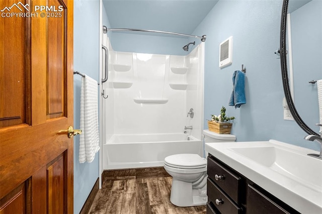 321 Graceland Grv, Colorado Springs, CO 80904 - bathroom with vanity, toilet, wood finished floors, and shower / tub combination