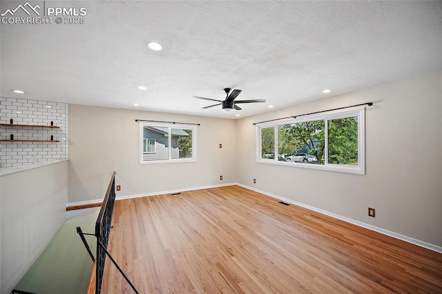 1515 W Boulder St, Colorado Springs, CO 80904 - unfurnished room with wood finished floors, ceiling fan, baseboards, and recessed lighting