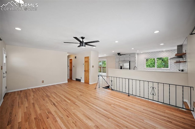 1515 W Boulder St, Colorado Springs, CO 80904 - empty room with ceiling fan, light wood-style floors, recessed lighting, and baseboards