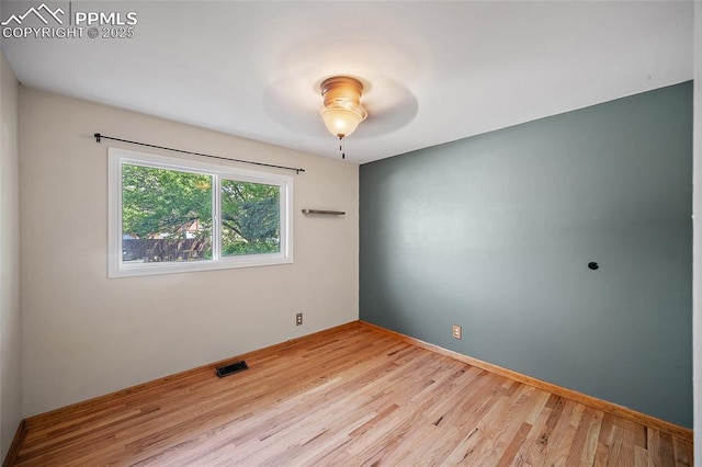 1515 W Boulder St, Colorado Springs, CO 80904 - unfurnished room with wood finished floors and a ceiling fan