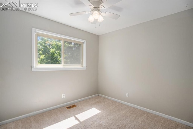 1125 Moffat Cir, Colorado Springs, CO 80915 - spare room with carpet, baseboards, and a ceiling fan