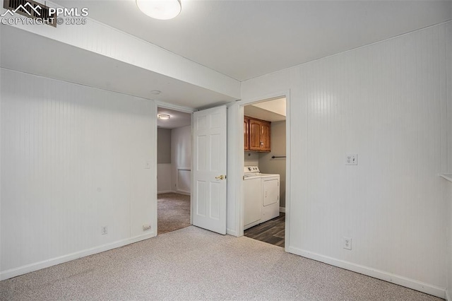 1125 Moffat Cir, Colorado Springs, CO 80915 - unfurnished room featuring separate washer and dryer, carpet flooring, and baseboards