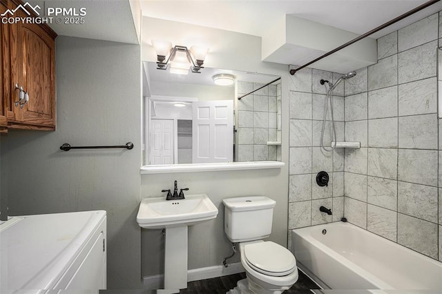 1125 Moffat Cir, Colorado Springs, CO 80915 - full bath with toilet, washtub / shower combination, and a sink