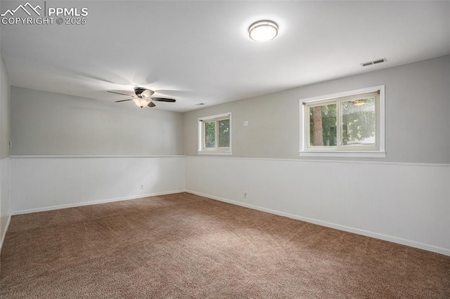 1125 Moffat Cir, Colorado Springs, CO 80915 - spare room featuring carpet, a ceiling fan, and baseboards