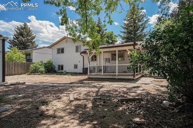 1125 Moffat Cir, Colorado Springs, CO 80915 - rear view of house featuring a porch and cooling unit
