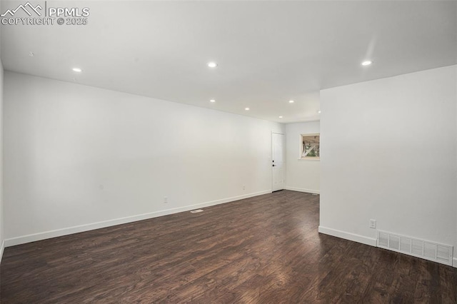 1125 Moffat Cir, Colorado Springs, CO 80915 - empty room with dark wood finished floors, recessed lighting, and baseboards