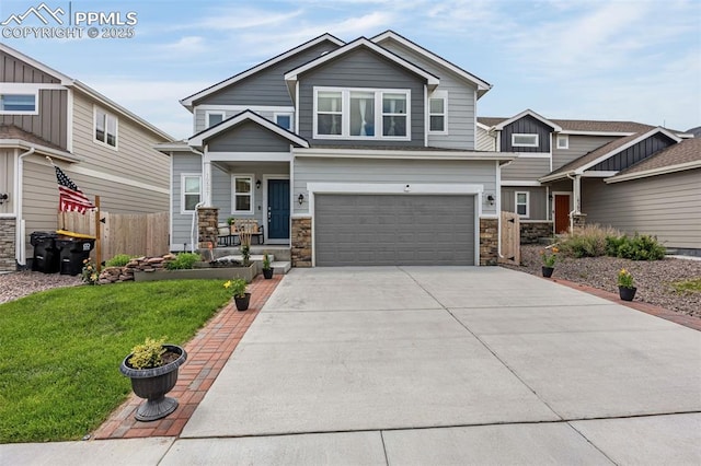 10597 Luneth Dr, Colorado Springs, CO 80925 - craftsman house with a garage, stone siding, concrete driveway, and covered porch