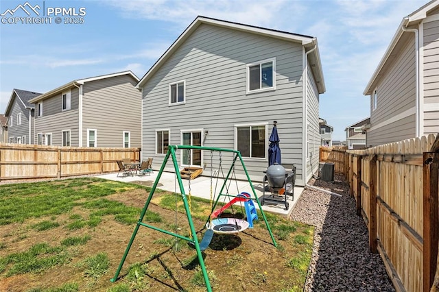 10597 Luneth Dr, Colorado Springs, CO 80925 - back of property featuring a patio and central air condition unit