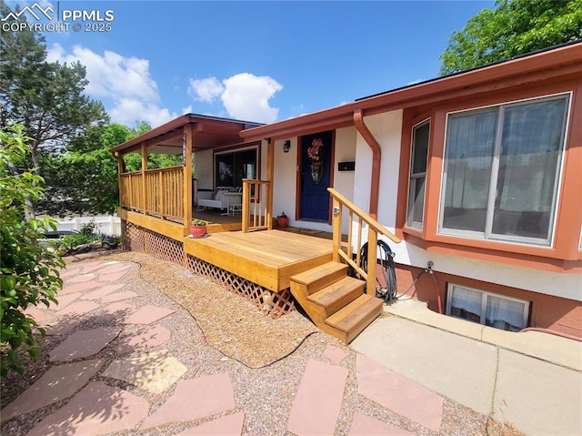 2115 Rangeview Dr, Pueblo, CO 81008 - property entrance with stucco siding