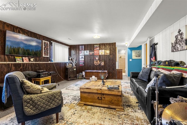 2115 Rangeview Dr, Pueblo, CO 81008 - carpeted living room featuring wood walls