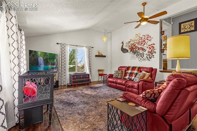 2115 Rangeview Dr, Pueblo, CO 81008 - living area featuring a ceiling fan, wood finished floors, lofted ceiling, and a textured ceiling