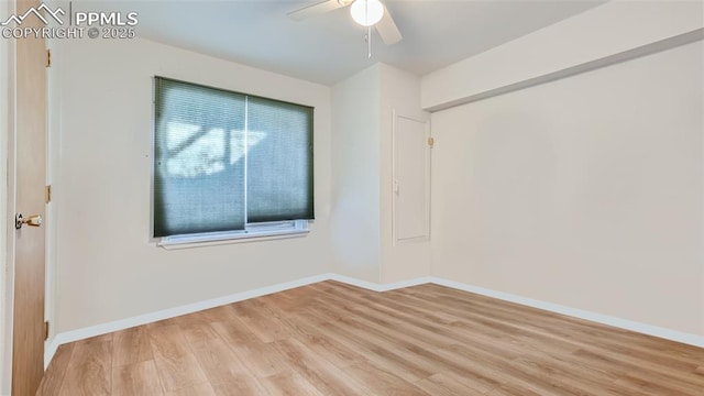 971 S Los Charros Dr, Pueblo West, CO 81007 - spare room with light wood-type flooring, a ceiling fan, and baseboards