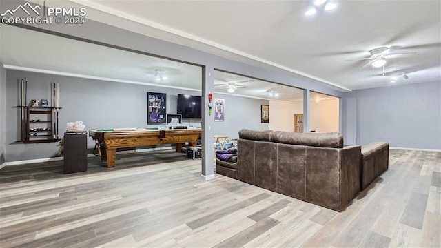 971 S Los Charros Dr, Pueblo West, CO 81007 - living room with ceiling fan, wood finished floors, and baseboards