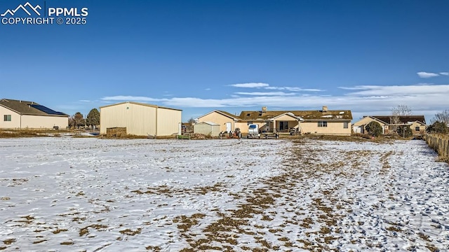 971 S Los Charros Dr, Pueblo West, CO 81007 - snow covered house featuring a residential view