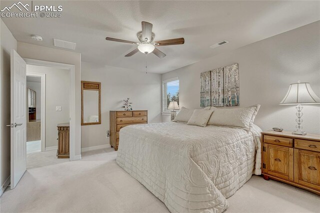 14745 Millhaven Pl, Colorado Springs, CO 80908 - bedroom with light colored carpet, baseboards, and a ceiling fan