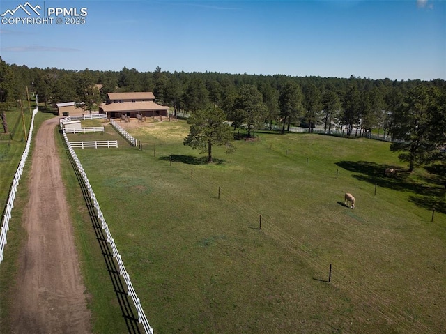 8610 Wildridge Rd, Colorado Springs, CO 80908 - overview of rural landscape with agricultural land and a heavily wooded area